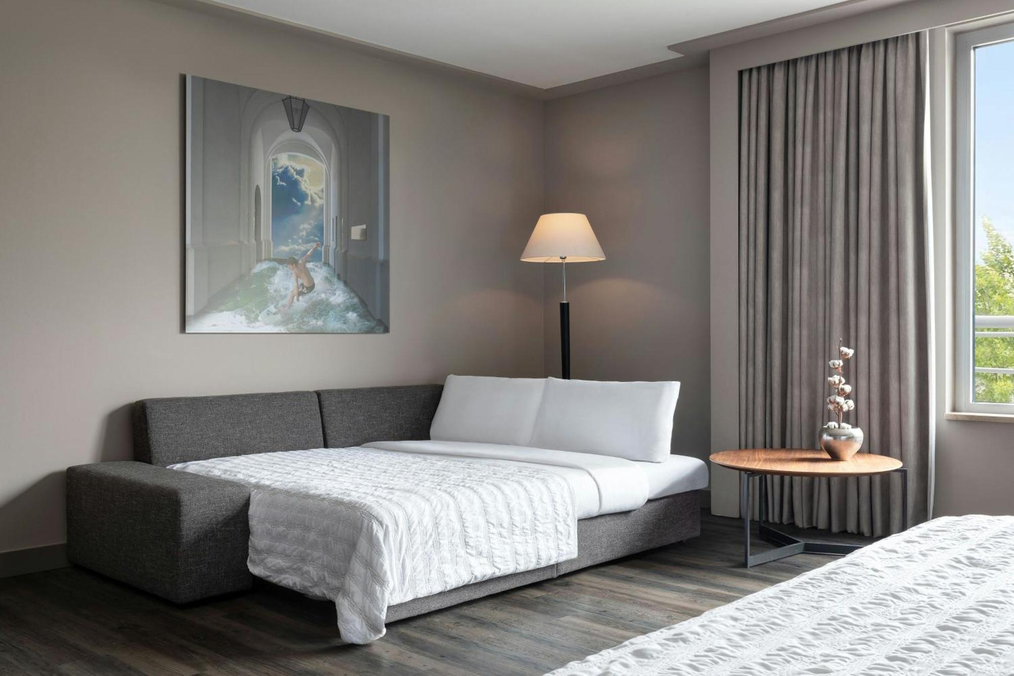 Le Meridien München Kültér fotó A sofa bed